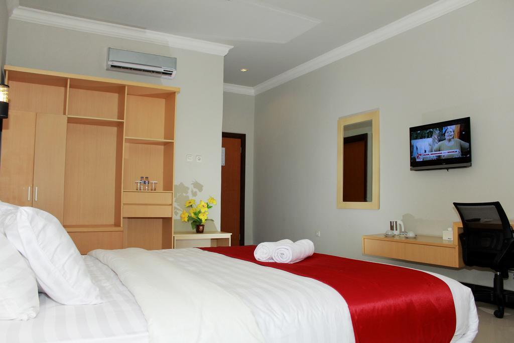 Raja Residence Jambi Джамбі Номер фото