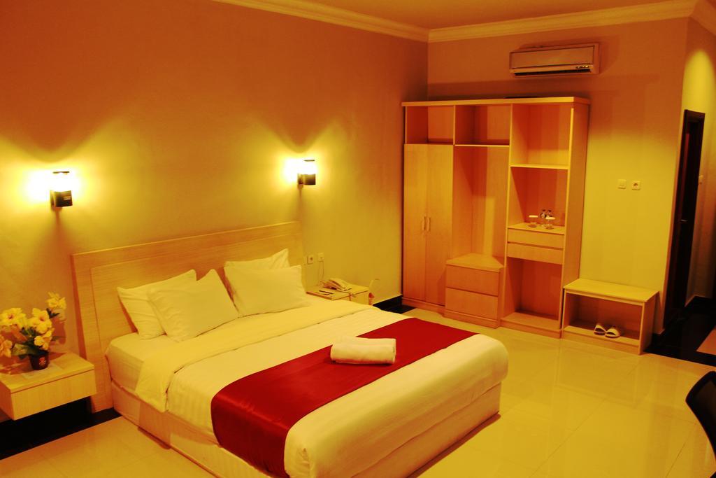 Raja Residence Jambi Джамбі Номер фото